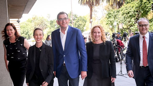 Premier Daniel Andrews (centre) with new members of his ministry - Jaclyn Symes, Gabrielle Williams, Melissa Horne and Adem Somyurek.
