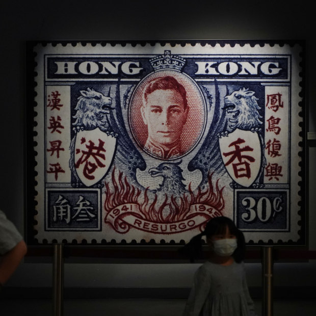 A poster of a British Hong Kong postal stamp featuring the picture of King George VI, is displayed at the Hong Kong Story exhibition. 