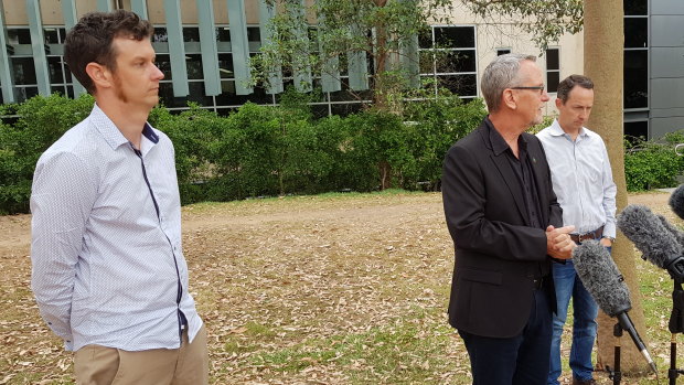 UQ scientists Professor Keith Chappell (left), Professor Paul Young and Professor Trent Munro explain to the media why their vaccine program is being halted.