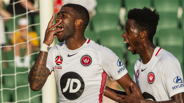 False dawn: Roly Bonevacia celebrates a goal for the Wanderers, but it wasn't enough to stall a late Perth comeback.