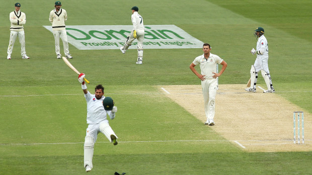 A jubliant Yasir Shah celebrates his century at Adelaide Oval.