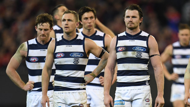 Low point: Joel Selwood and Patrick Dangerfield lead the Cats from the field after their elimination final loss to Melbourne in 2018.