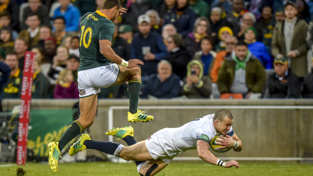 Wide man: South Africa's Handre Pollard can't stop Mike Brown from scoring in Bloemfontein.