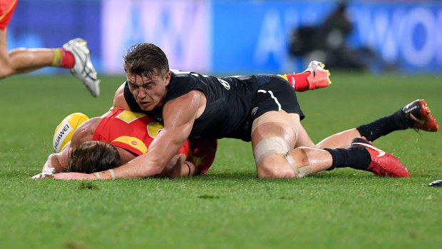 David Swallow was concussed in this tackle from Patrick Cripps.