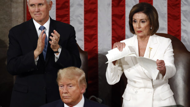 House Speaker Nancy Pelosi tears her copy of President Donald Trump's 2020 State of the Union address after he delivered it to a joint session of Congress. 