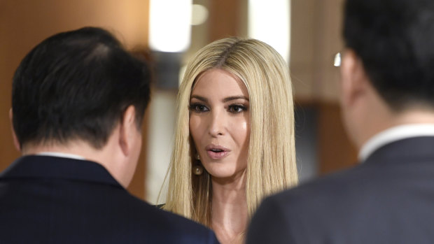 Ivanka Trump talks to business leaders in Seoul before her father made an address. 