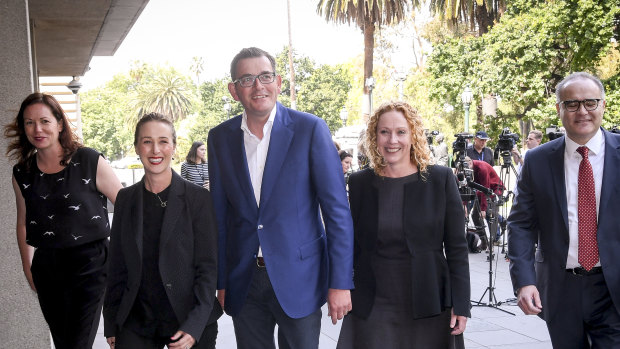 Premier Daniel Andrews (centre) with new members of his ministry - Jaclyn Symes, Gabrielle Williams, Melissa Horne and Adem Somyurek.