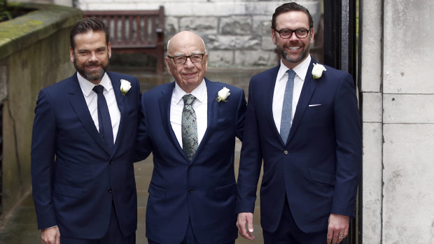 Media Mogul Rupert Murdoch poses for a photograph with his sons Lachlan and James.