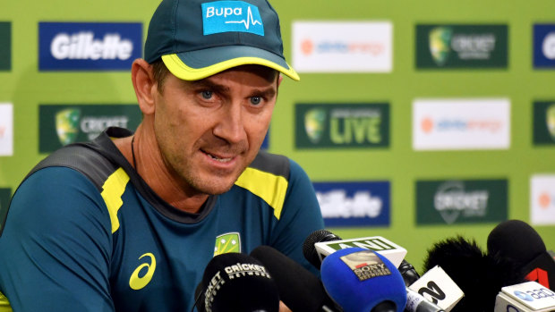 Feeling the strain: Australian coach Justin Langer speaking at the media conference in Sydney where he got 'two out of 10 grumpy'. 