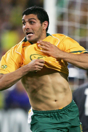 John Aloisi celebrates scoring the winning goal in the penalty shootout between Australia and Uruguay in 2005.