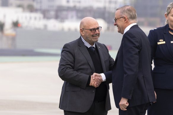 Former Australian ambassador to the US Arthur Sinodinos (left) greets Prime Minister Anthony Albanese on his arrival in San Diego on March 11 ahead of the AUKUS announcement.