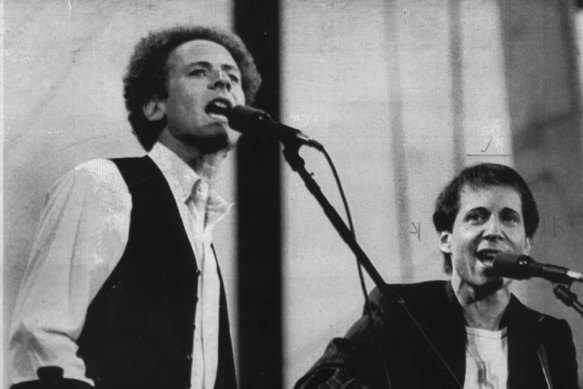 Art Garfunkel and Paul Simon perform for about 400,000 fans in Central Park. 