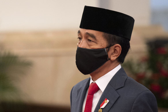 Indonesian President Joko Widodo wears a mask as a precaution against coronavirus on April 30.