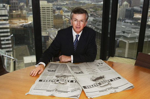 MinterEllison lawyer Peter Bartlett with a copy of <i>The Age</i> from 1980, when the paper pulled a story about the Anzus Papers for legal reasons and replaced it with an advertisement.