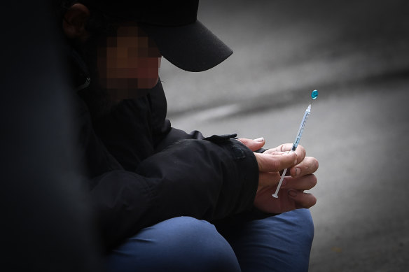 A drug user on the street in Richmond.