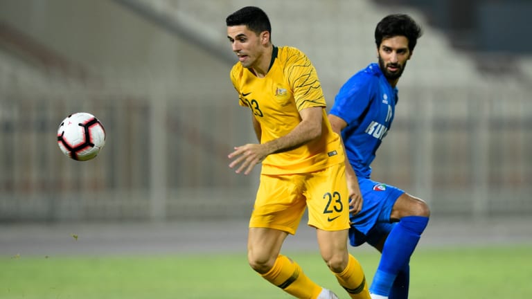 High praise: Socceroos boss Graham Arnold has tipped Tom Rogic (left) to be the star of the Asian Cup.