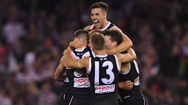Jade Gresham rides the celebration after the round four win over Hawthorn.