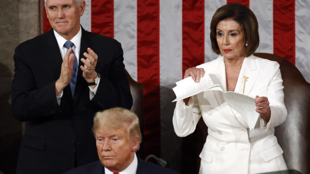 Nancy Pelosi tears up her copy of President Trump's 2020 State of the Union address after he delivered it to a joint session of Congress. 