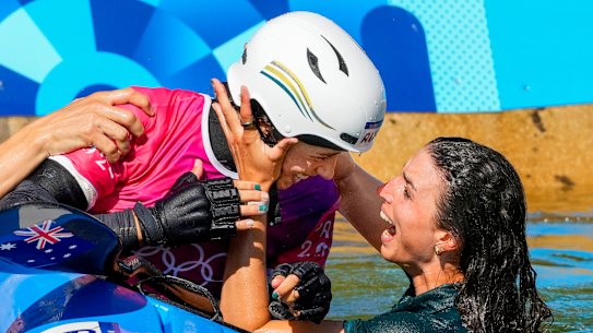 Noémie Fox (left) is congratulated by her sister Jess.