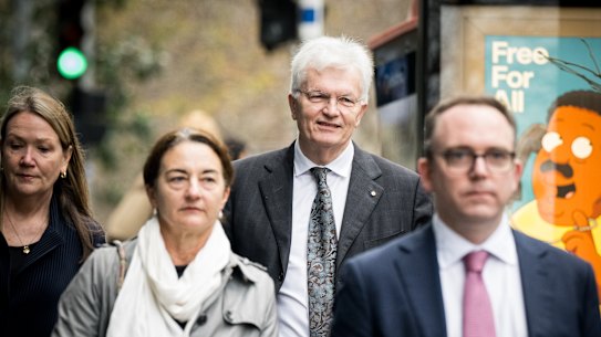 Professor Glyn Davis (centre), interim vice-chancellor of the University of Melbourne, arrives at a hearing of the Royal Commission into Antisemitism and Social Cohesion.