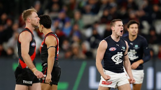 MELBOURNE, AUSTRALIA - JUNE 10: Matthew Owies of the Blues celebrates a goal during the 2022 AFL Round 13 match between the Essendon Bombers and the Carlton Blues at the Melbourne Cricket Ground on June 10, 2022 in Melbourne, Australia. (Photo by Michael Willson/AFL Photos via Getty Images)