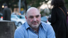 Property developer, Daniel Hausman, has pleaded guilty to blackmail.