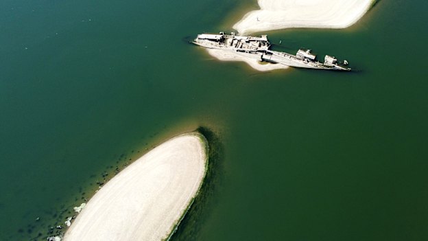 The remains of a German ship lie exposed near a large dam on the Danube River near Prahovo in Serbia.