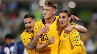 Harry Souttar of the Socceroos celebrates scoring a goal against Nepal.