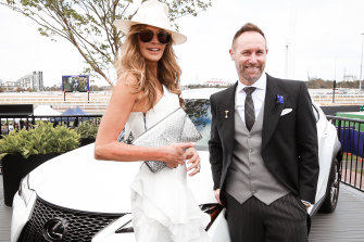 Poser: Lexus Australia CEO Scott Thompson and Elle Macpherson hams it up for the cameras in the Lexus marquee at Derby Day 2018.
