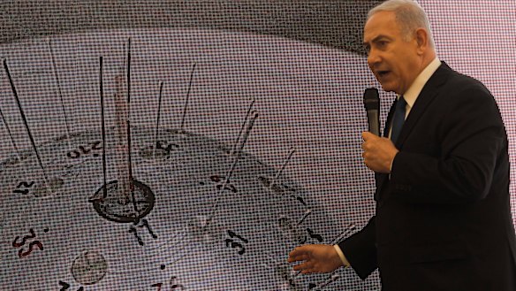 Israeli Prime Minister Benjamin Netanyahu presents material on Iranian nuclear weapons development.