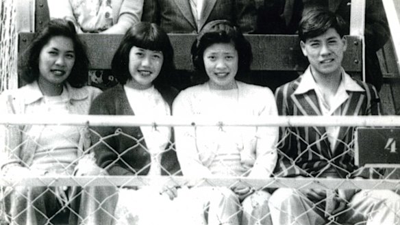 Elizabeth Chong, aged about 14, second from left, with siblings on the scenic railway at Toowoomba, Queensland.