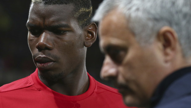 Symptomatic relationship: Paul Pogba with Jose Mourinho. The French star's relationship with the manager had deteriorated alarmingly.