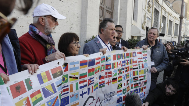 Sex abuse survivors and members of the Ending Clergy Abuse take their message to the Vatican on Wednesday. 