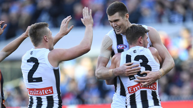 Collingwood's Mason Cox and Taylor Adams (far right) will both sit out Saturday's match against Carlton, with Adams expected to miss four games.