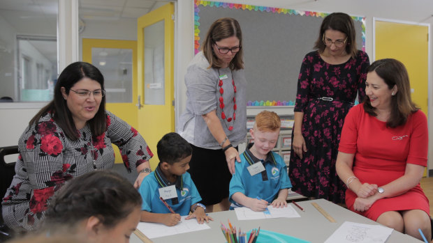 Education Minister Grace Grace and Queensland Premier Annastacia Palaszczuk with students at Spring Mountain State School near Springwood.