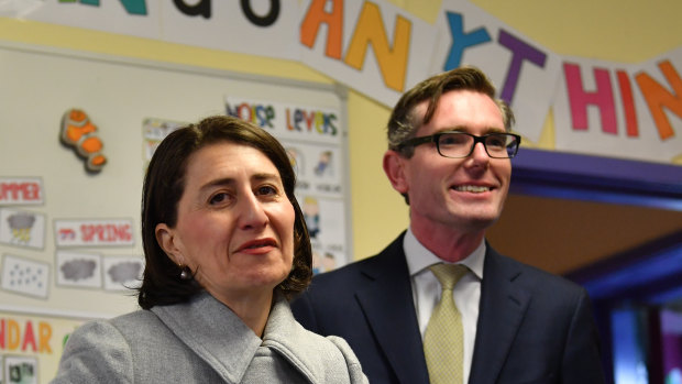NSW Premier Gladys Berejiklian and Treasurer Dominic Perrottet attend a pre-budget education announcement on Monday.