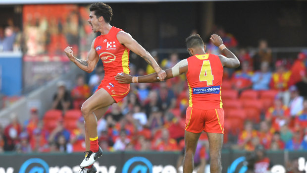 Golden moment: Alex Sexton (left) fired up in the fourth quarter to help the Suns take control of the game against the Dockers.