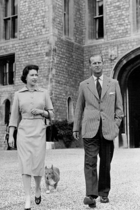 The Queen, seen here with Prince Philip and her corgi Sugar in 1959, apparently brought a corgi on her honeymoon.  
