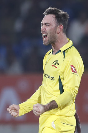 Glenn Maxwell celebrates the wicket of Shreyas Iyer in India.