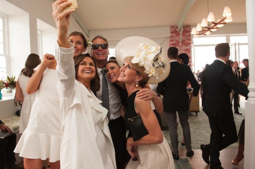 Up close and personal, the good old days: Then deputy PM Julie Bishop and her partner David Panton pose for a selfie with TV host Lisa Wilkinson and friends in the Emirates marquee on Derby Day 2017.