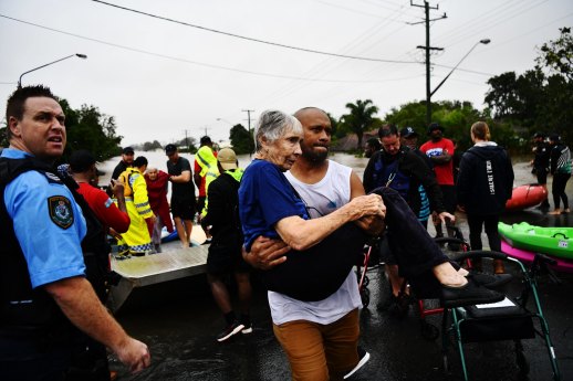 Local abattoir workers turned up at first light to carry elderly evacuees to shelter on Monday.