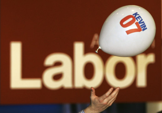 A supporter plays with a balloon before Kevin Rudd delivers his acceptance speech in 2007.