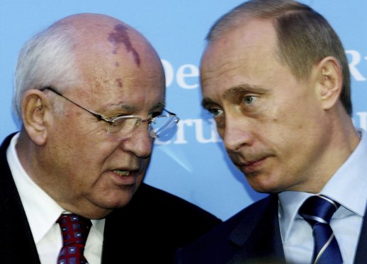 Russia’s President Vladimir Putin, right, talks with former Soviet President Mikhail Gorbachev at the Castle of Gottorf in Schleswig, northern Germany, 2004.