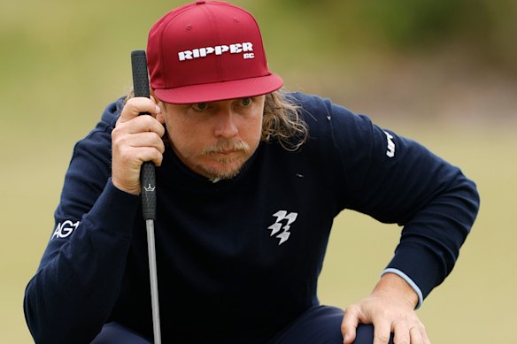 Cameron Smith of Australia lines up a putt.