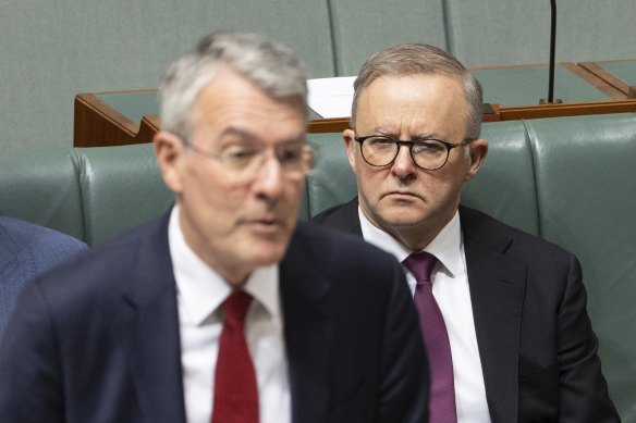 Prime Minister Anthony Albanese watching as Attorney-General Mark Dreyfus introduces Labor’s bill to establish a national anti-corruption commission.