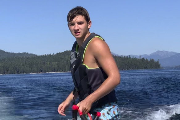 Ethan Chapin surfs on Priest Lake in northern Idaho in this family snapshot from July 2022.