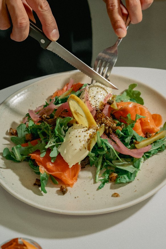 Smoked salmon, creme fraiche, pickled onions, capers and cornichons on Finnish Rye