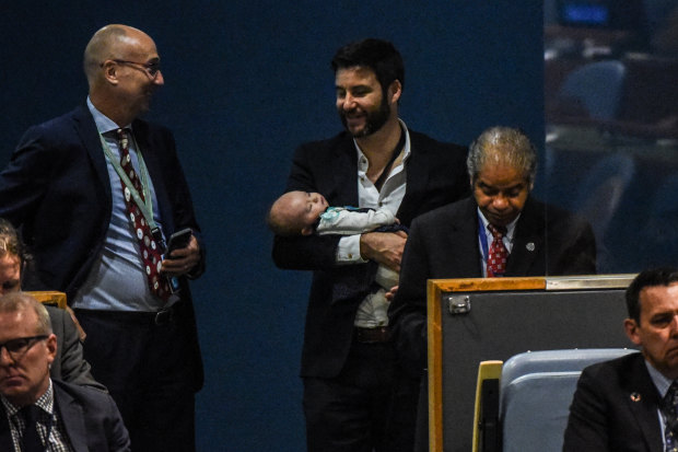 Ardern’s partner Clarke Gayford at the UN in New York, with their daughter Neve. It was the first time Neve's face was snapped in public – something Ardern was trying to avoid.