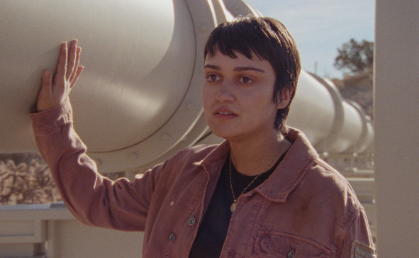 Ariela Barer, who co-wrote the script, plays a Latina who is mourning the sudden death of her mother in a heatwave in How to Blow Up a Pipeline.