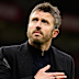 Michael Carrick reacts to supporters after his team lost.